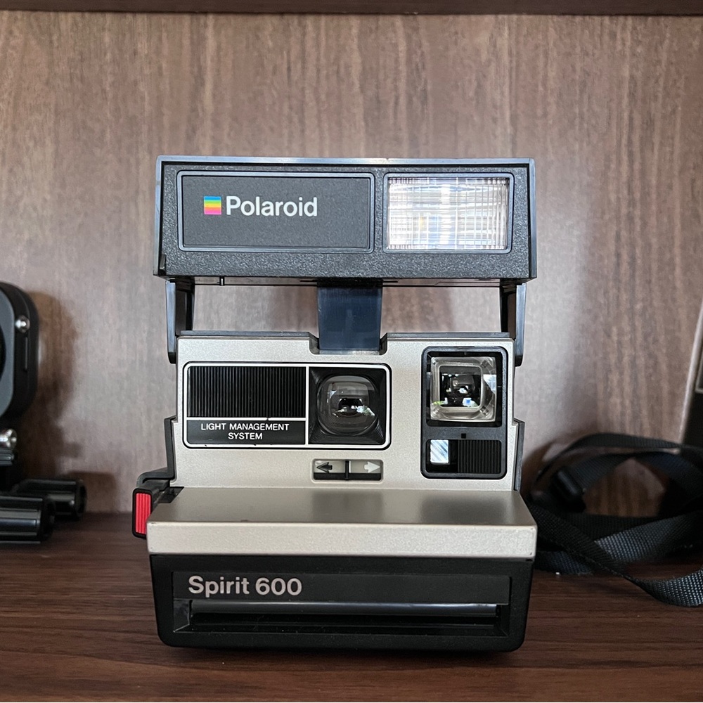 Vintage early 1980s Polaroid Spirit 600 Camera working, with flash.